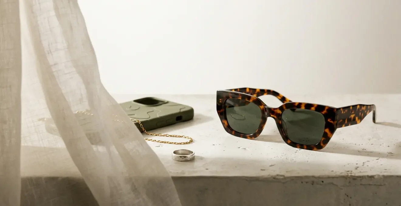 A visual metaphor capturing the fleeting nature of micro-trends in fashion, emphasizing impermanence and rapid obsolescence