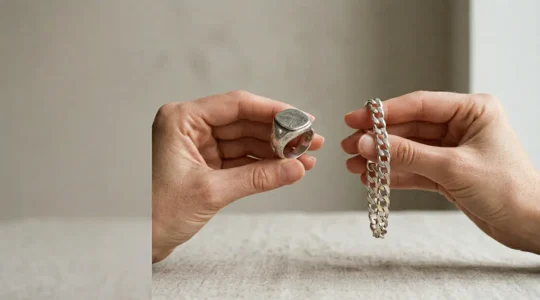 Two elegant silver jewelry pieces side by side showcasing sterling silver versus silver-plated construction for everyday wear